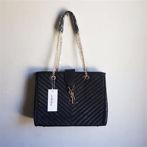 cartera negra yves saint laurent|Carteras y monederos Saint Laurent para mujer — FARFETCH.